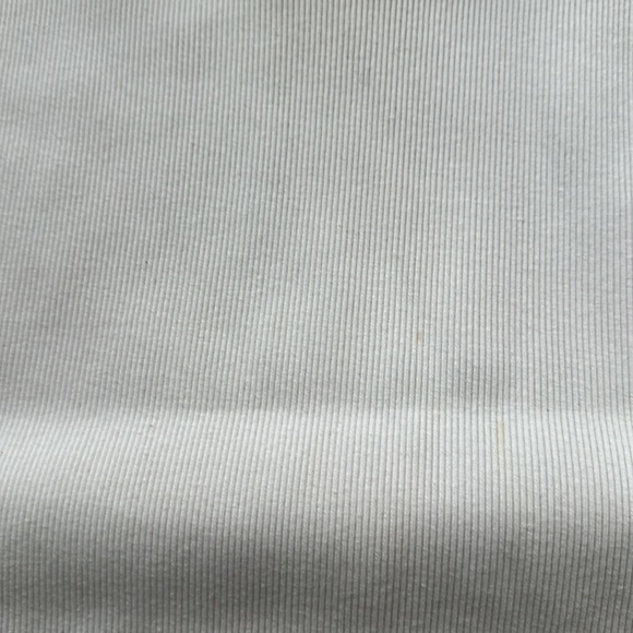 Elegant Cream Sleeveless Turtleneck Sweater - Picture 2 of 4